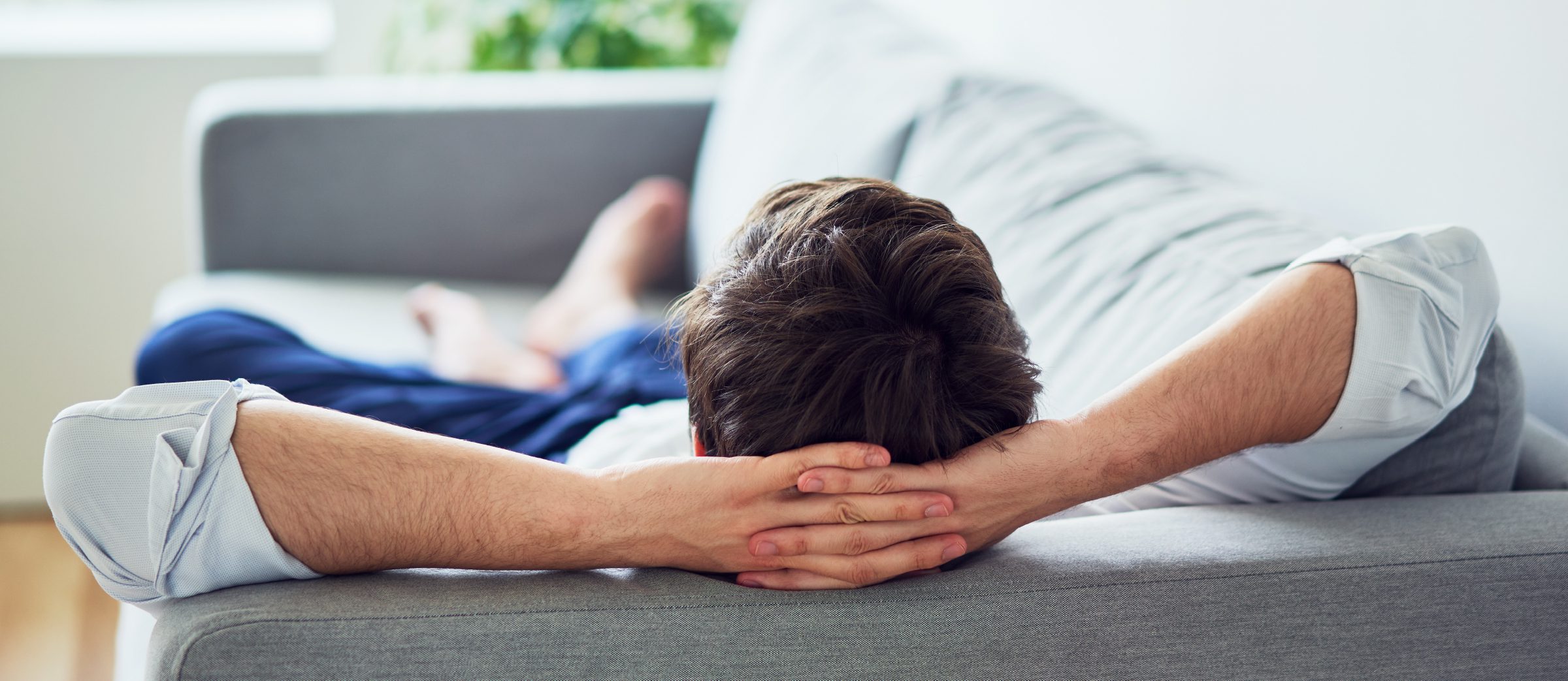 Man relaxing on a couce